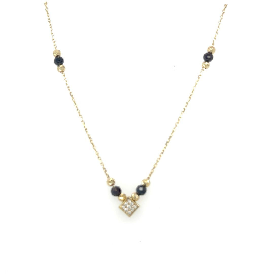 CH. MODE,BOULES NOIRES OR JAUNE 10KT
