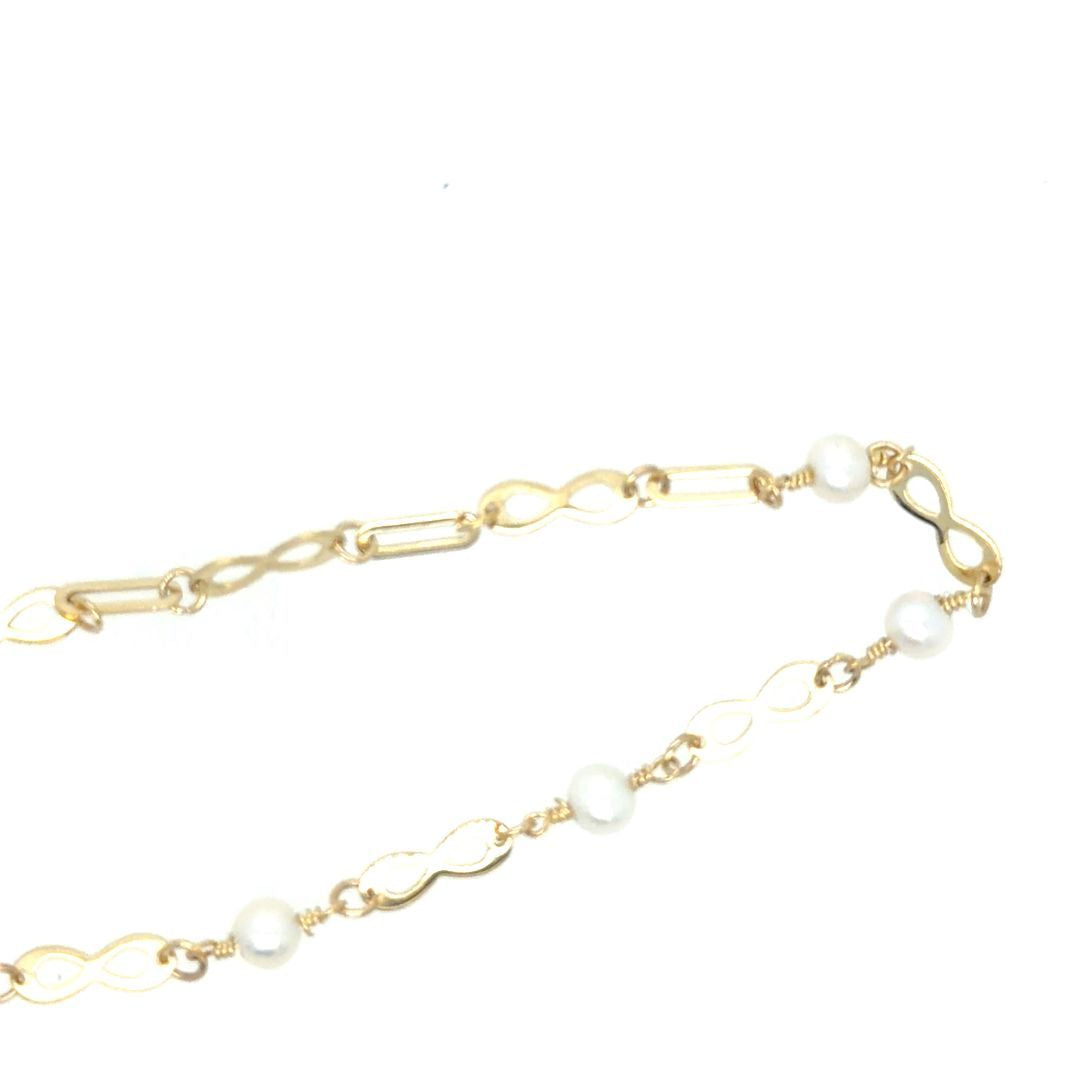 BRACELET 8INFINITY/ 10KT YELLOW GOLD BEADS
